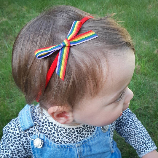 Rainbow Hair Bow for baby, toddler and child. LGBTQ, Gay Pride. Available on either a headband, pigtail alligator clips or single bow clip